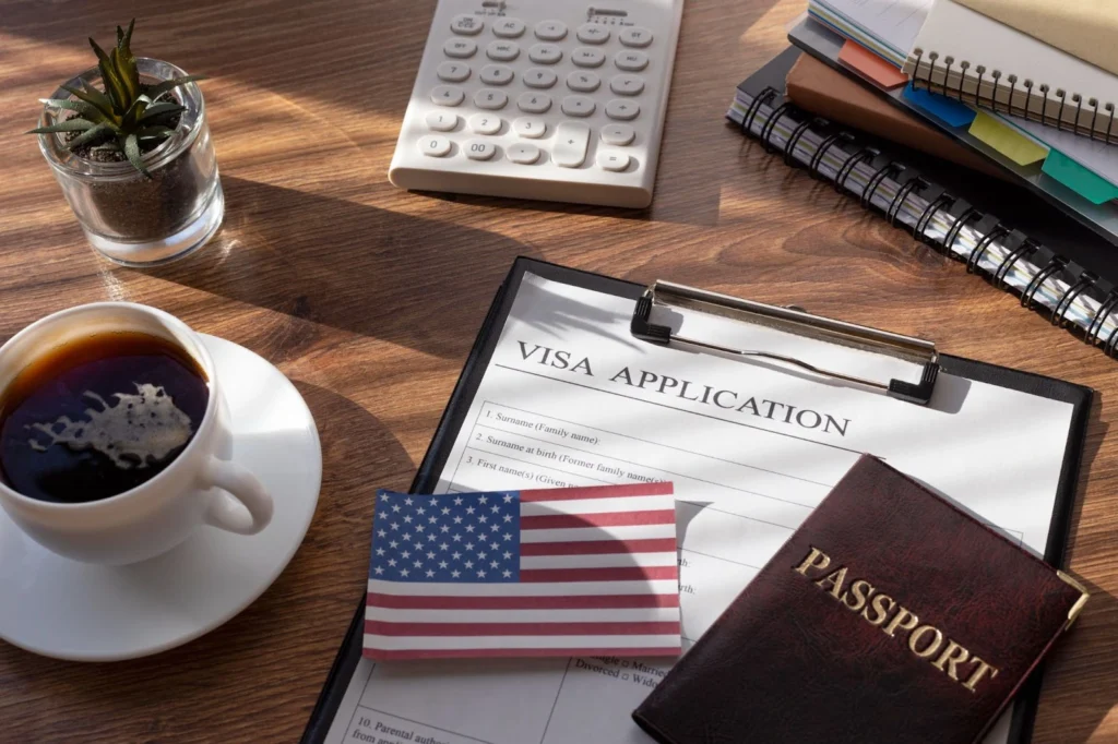 Important documents for going out the USA: a visa application, passport and the USA flag.
