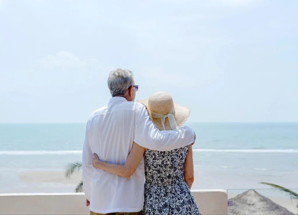 Couple hugging after investing in Mexico real estate.